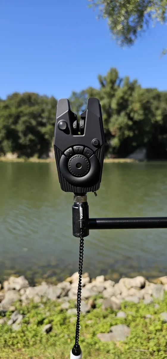 Bite alarm close-up by lake